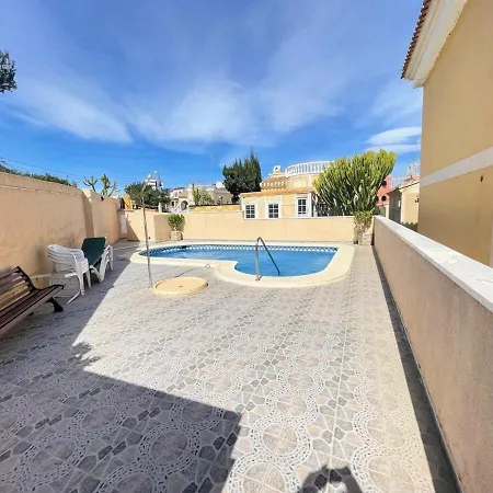 Holiday home Pleasant 4 Bedroom Townhouse With Com Pool Vm7