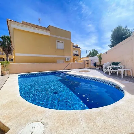 Holiday home Pleasant 4 Bedroom Townhouse With Com Pool Vm7